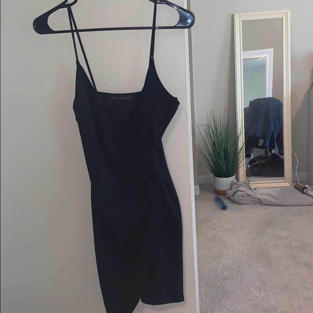 Fitted black dress asymmetrical bottom